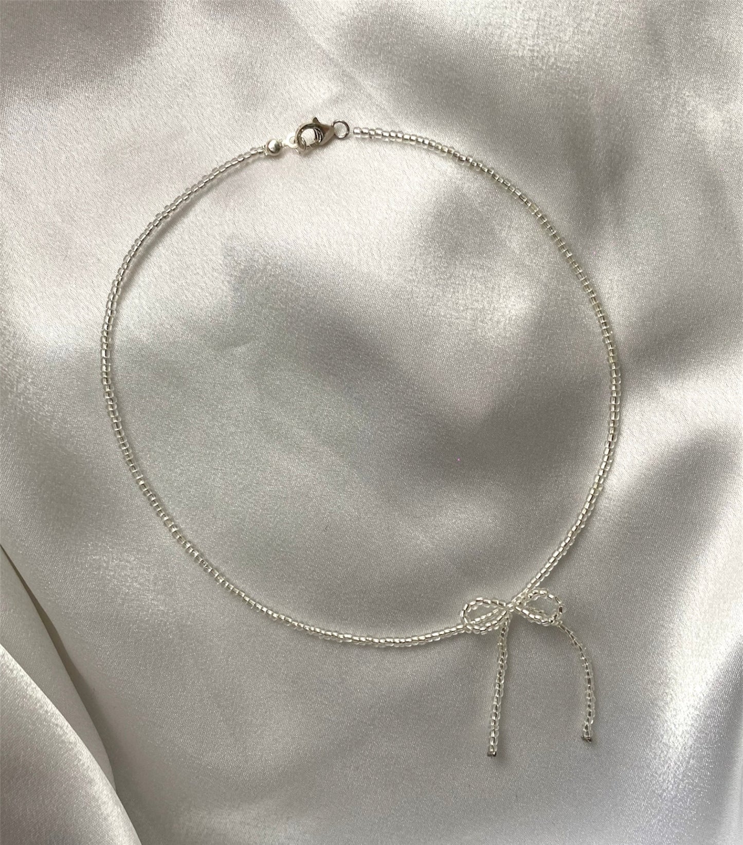 Vòng cổ nơ bạc